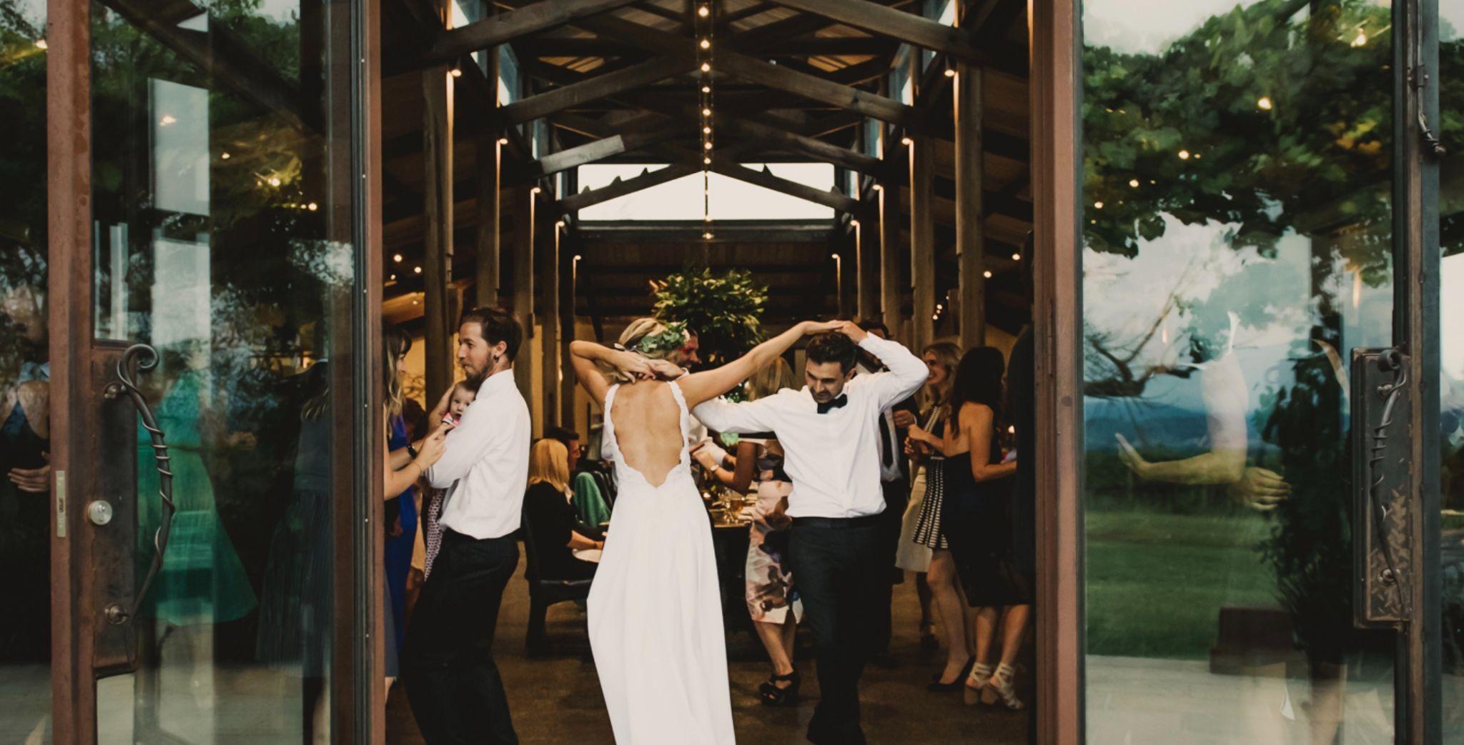 Photo Guests Dancing At Wedding