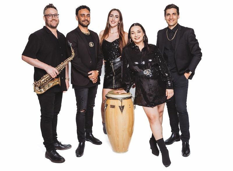 Brisbane band Funk 'N' Stuff 5 peice Brisbane band Funk 'N' Stuff standing with their instruments.