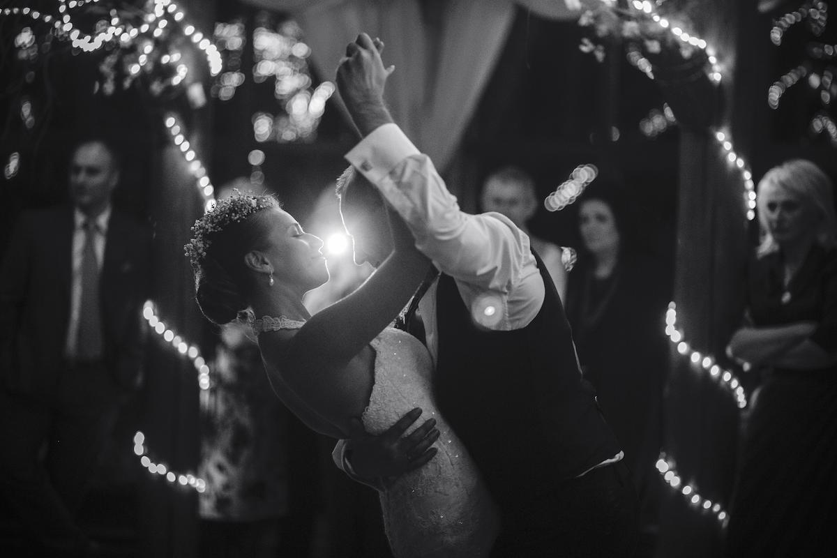 A happy couple dancing to a wedding dj at their Brisbane wedding. 