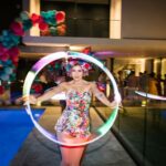 LED hoop performer entertaining guests at a colourful birthday party.