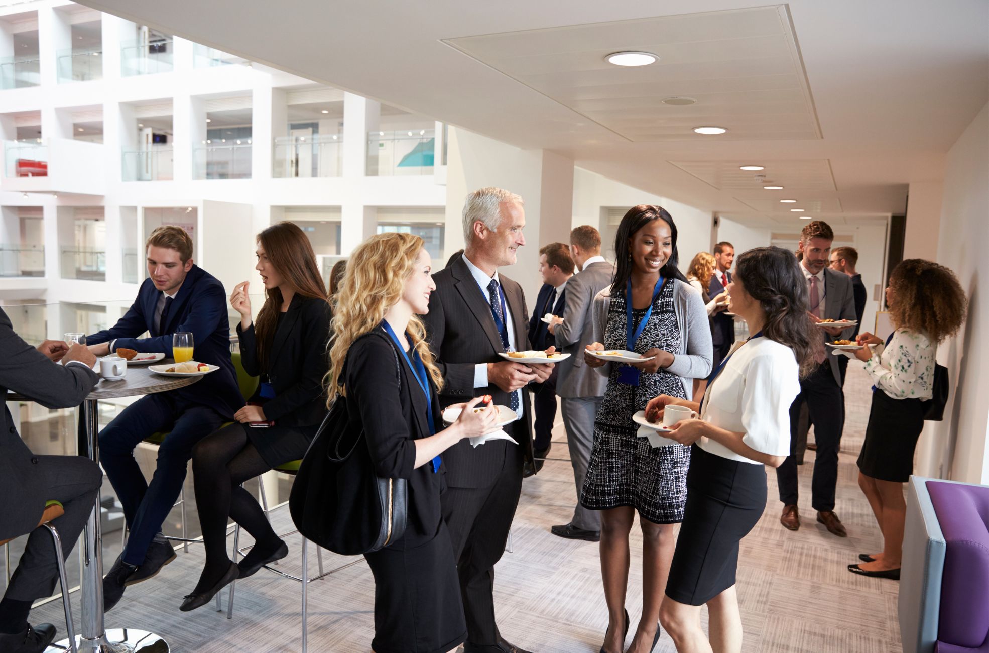 Employees Interacting At A Work Meeting