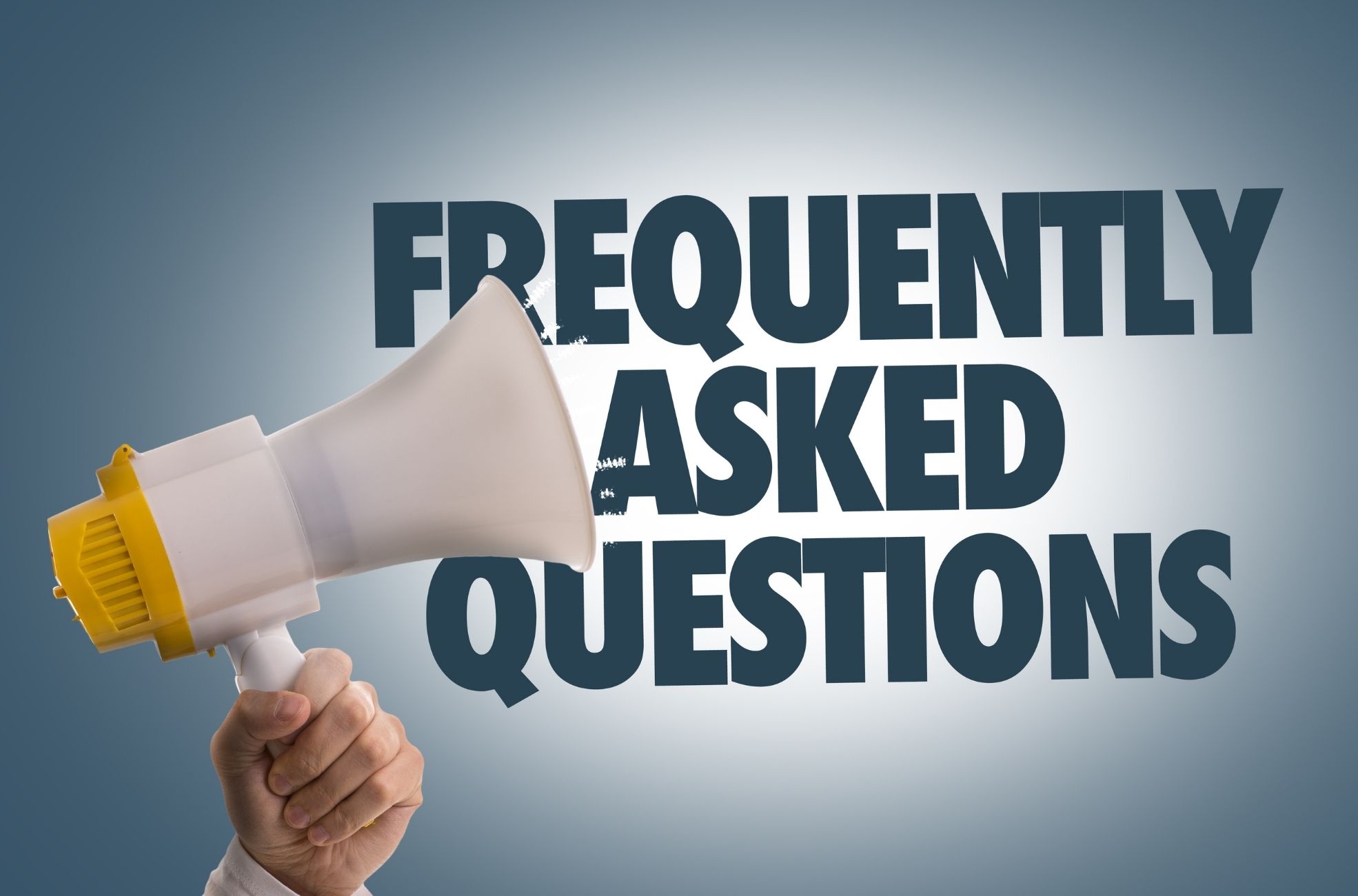 Frequently Asked Questions Written Next To Megaphone