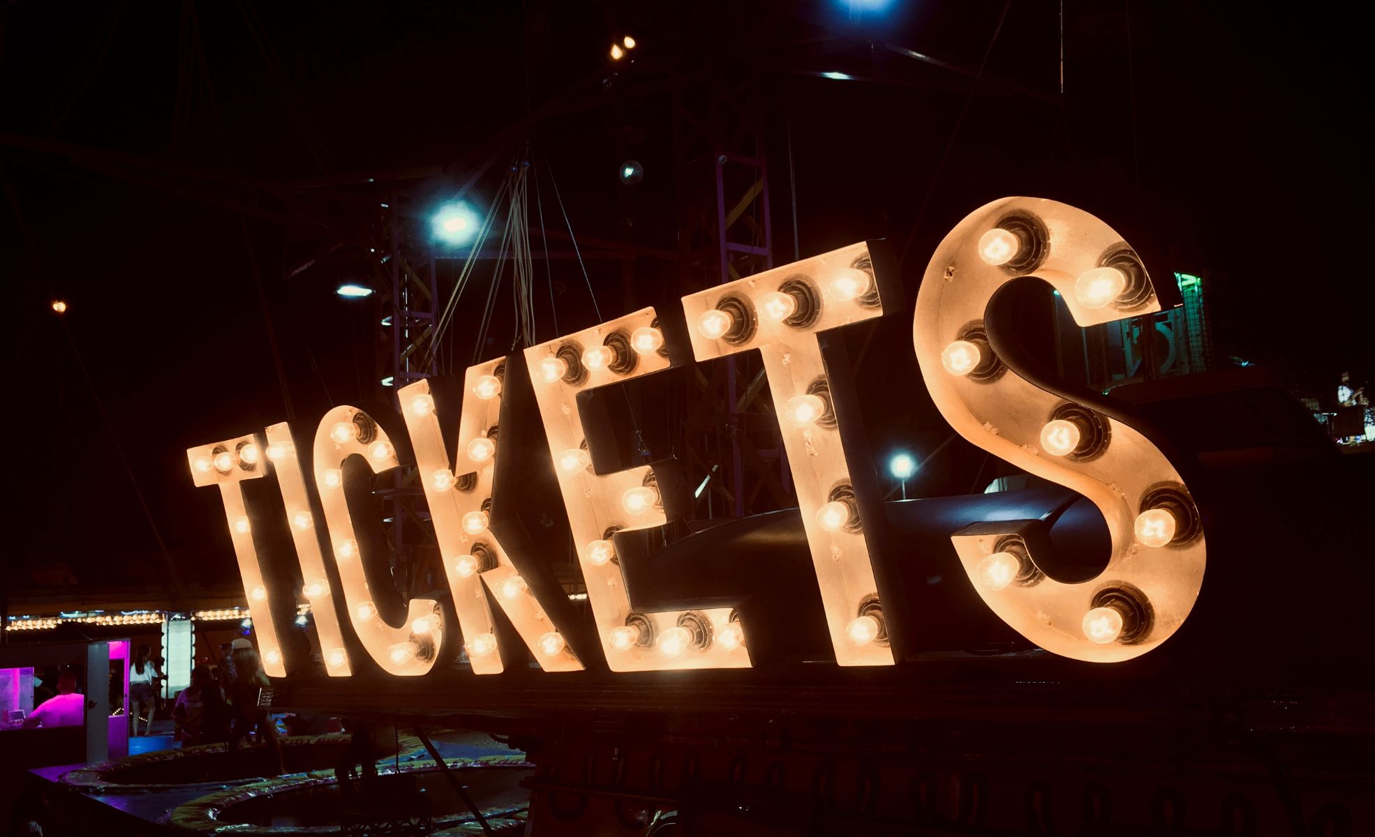 Word "Tickets" Written In Spotlights