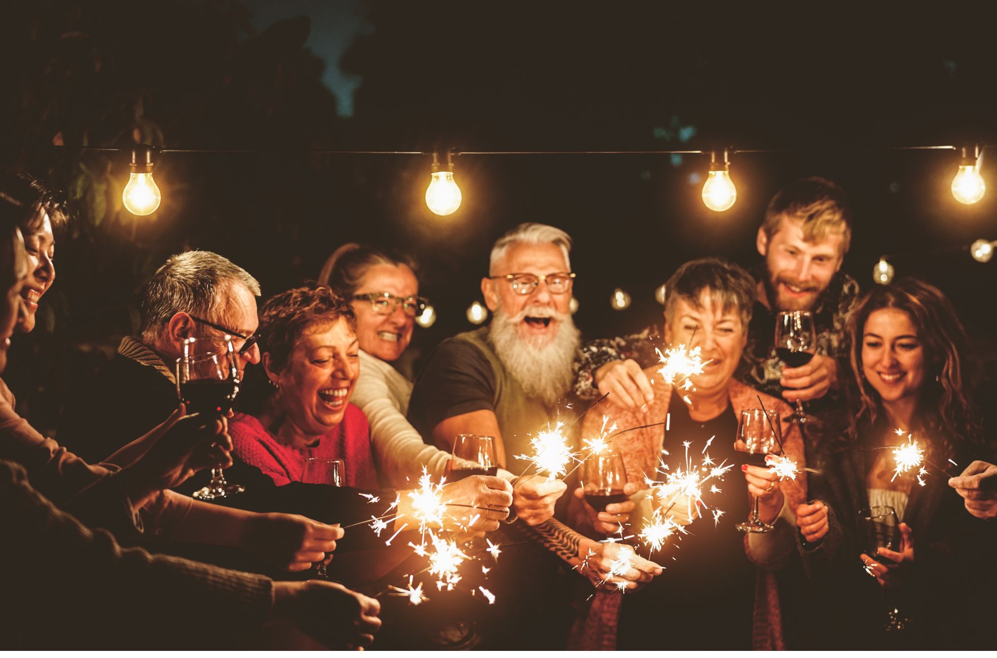 Family With Sparklers And Drinks 