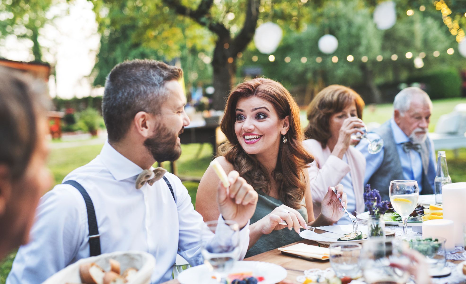 People Dining At Outdoor Wedding