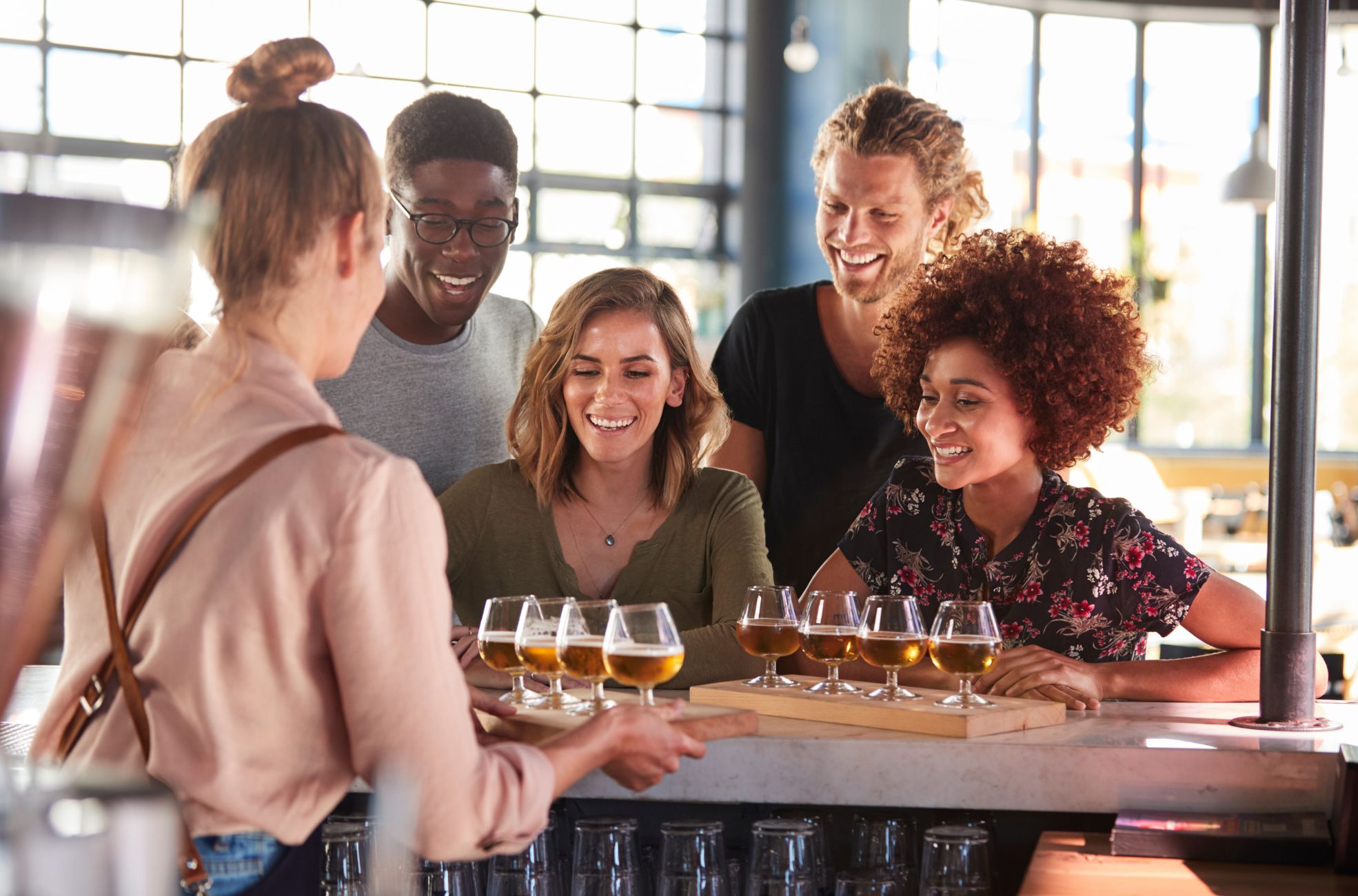 Woman Serving Party Guests Alcohol