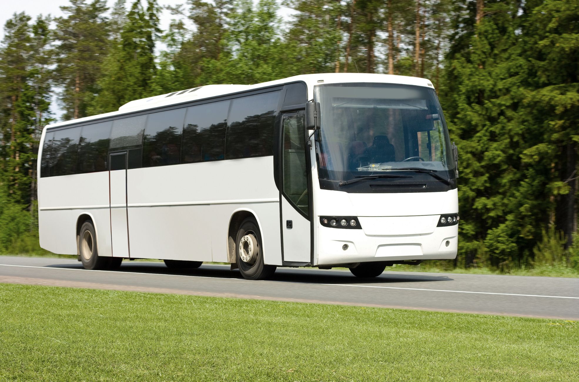 Coach Driving On Road