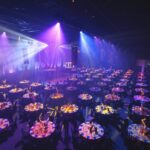 Corporate gala dinner on the Gold Coast with banquet tables, stage lighting and event production.