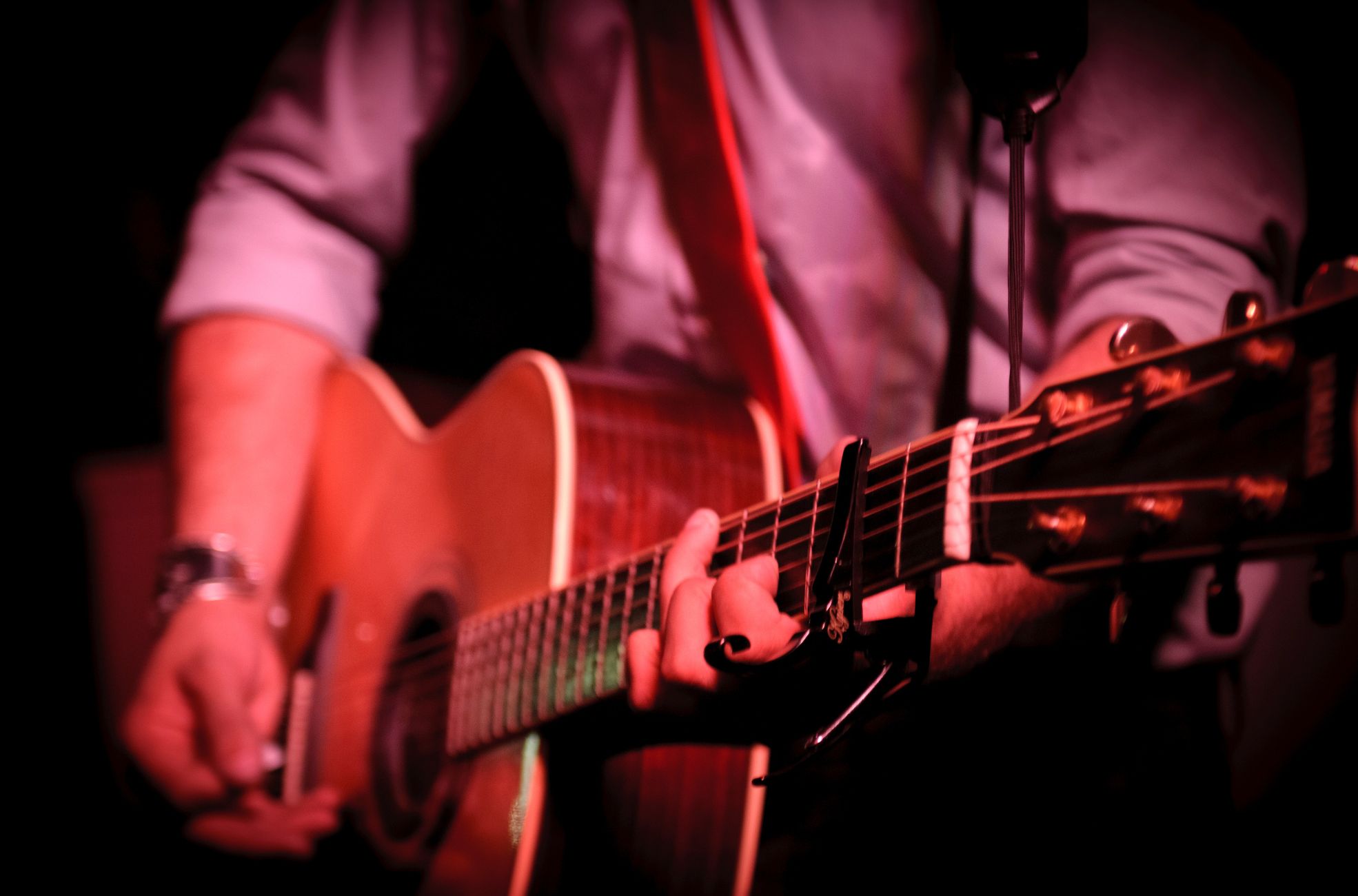 Man Playing Acoustic Guitar
