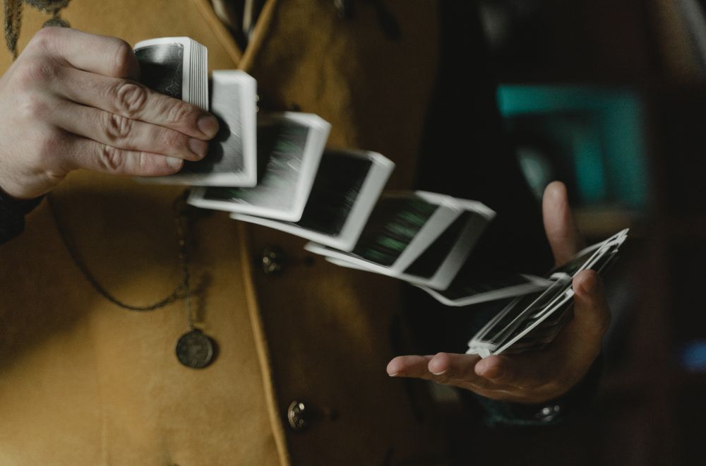 Magician Performing Card Trick