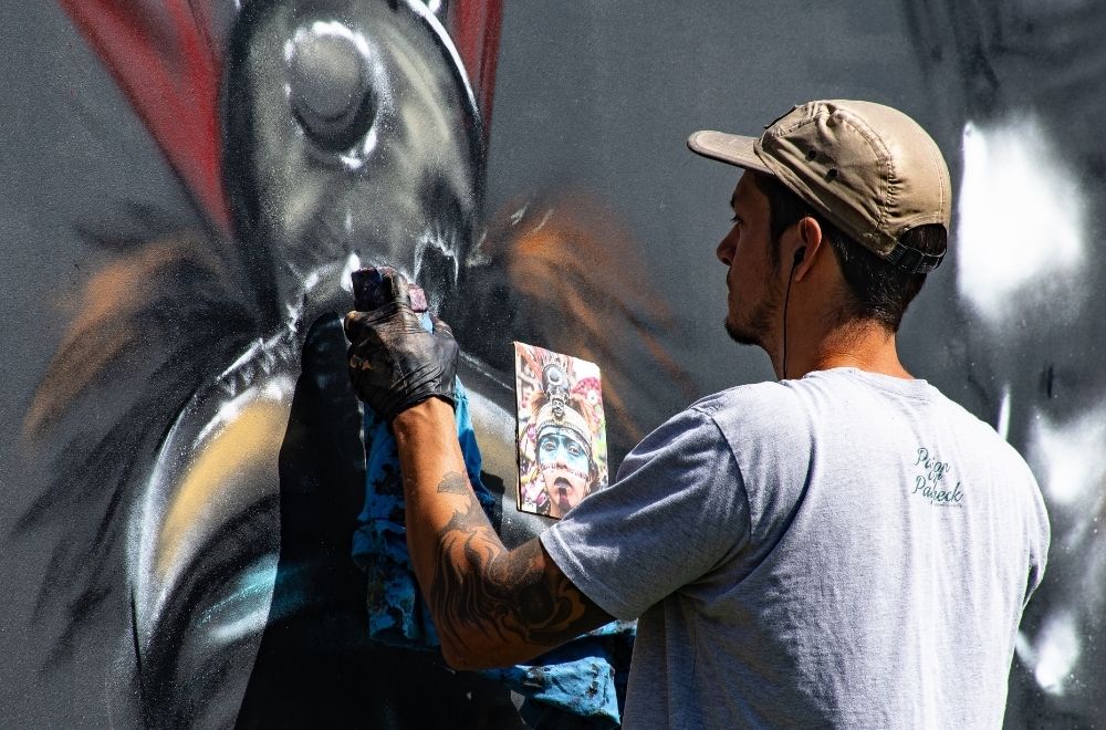 Artist Painting A Mural