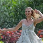 Woman Running Through Rain