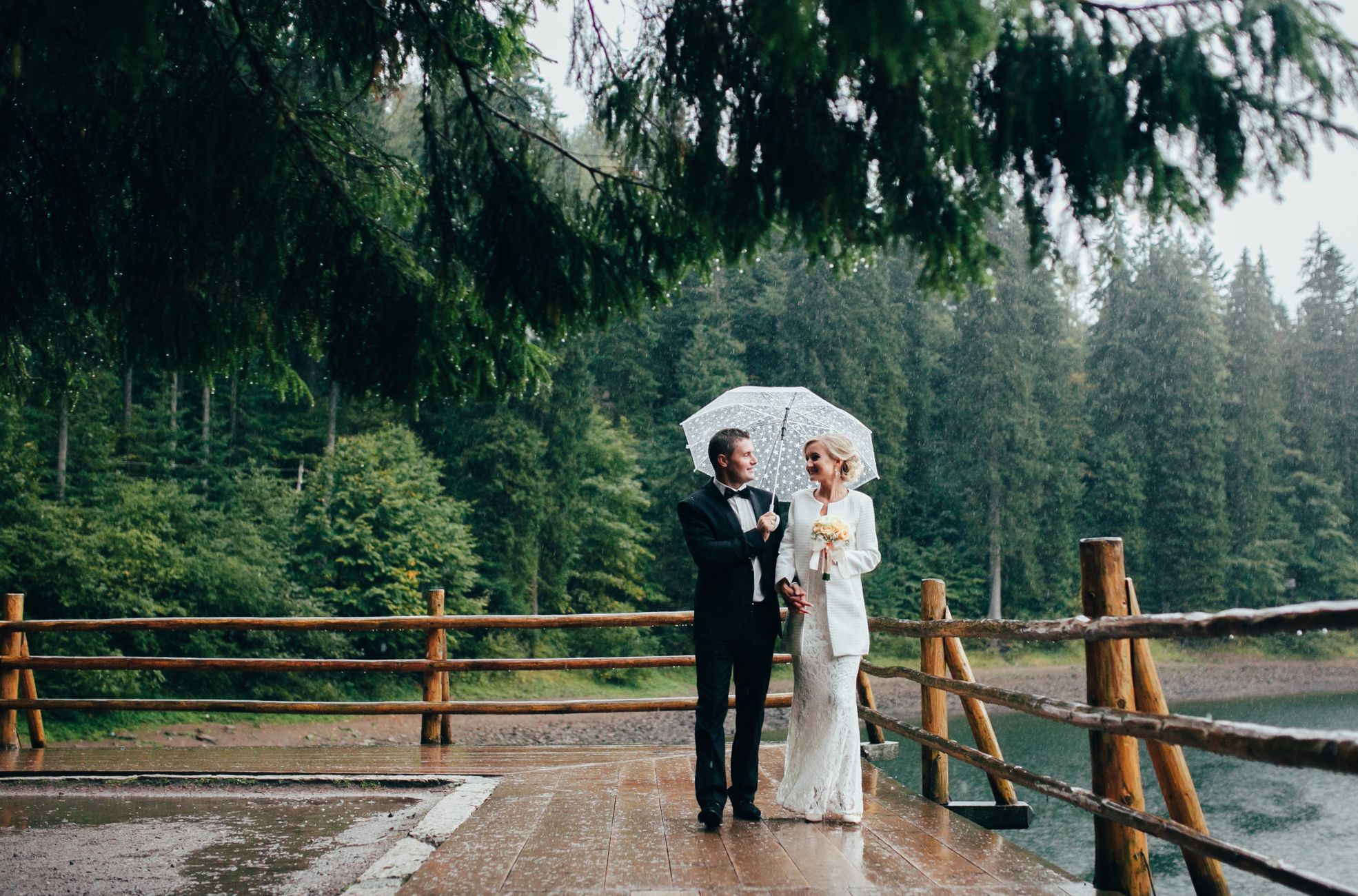 Wedding Couple Under Umbrella