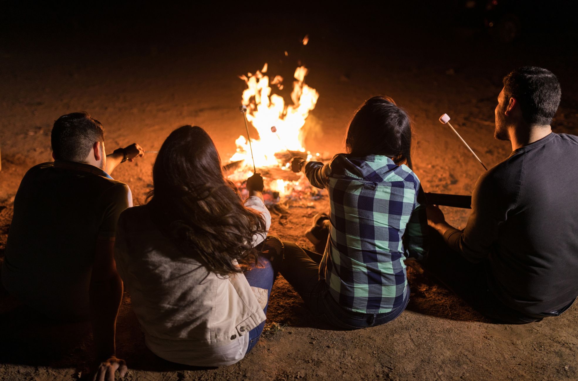 People Enjoying A Cosy Fire