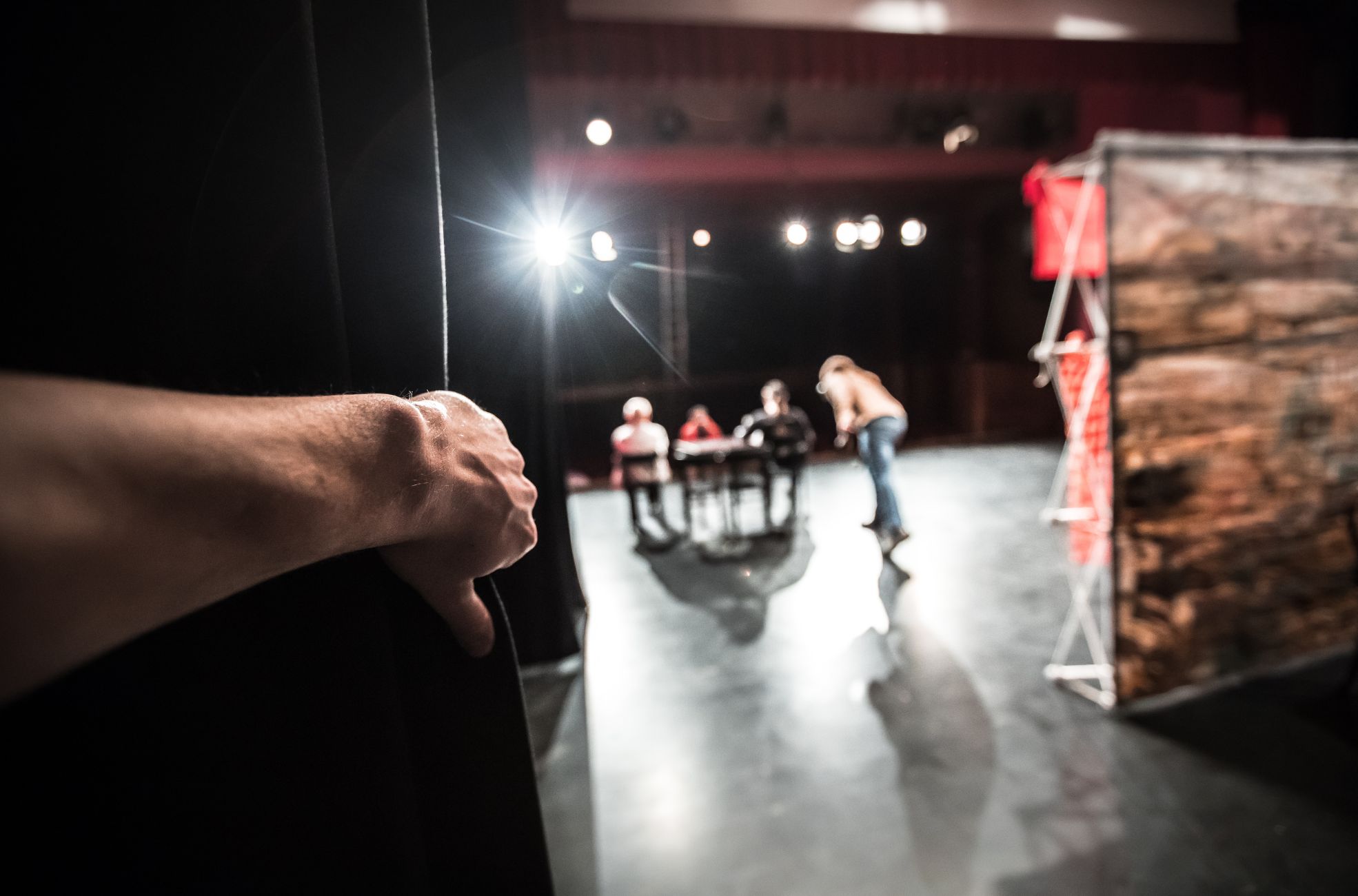 Person Looking Out From Backstage