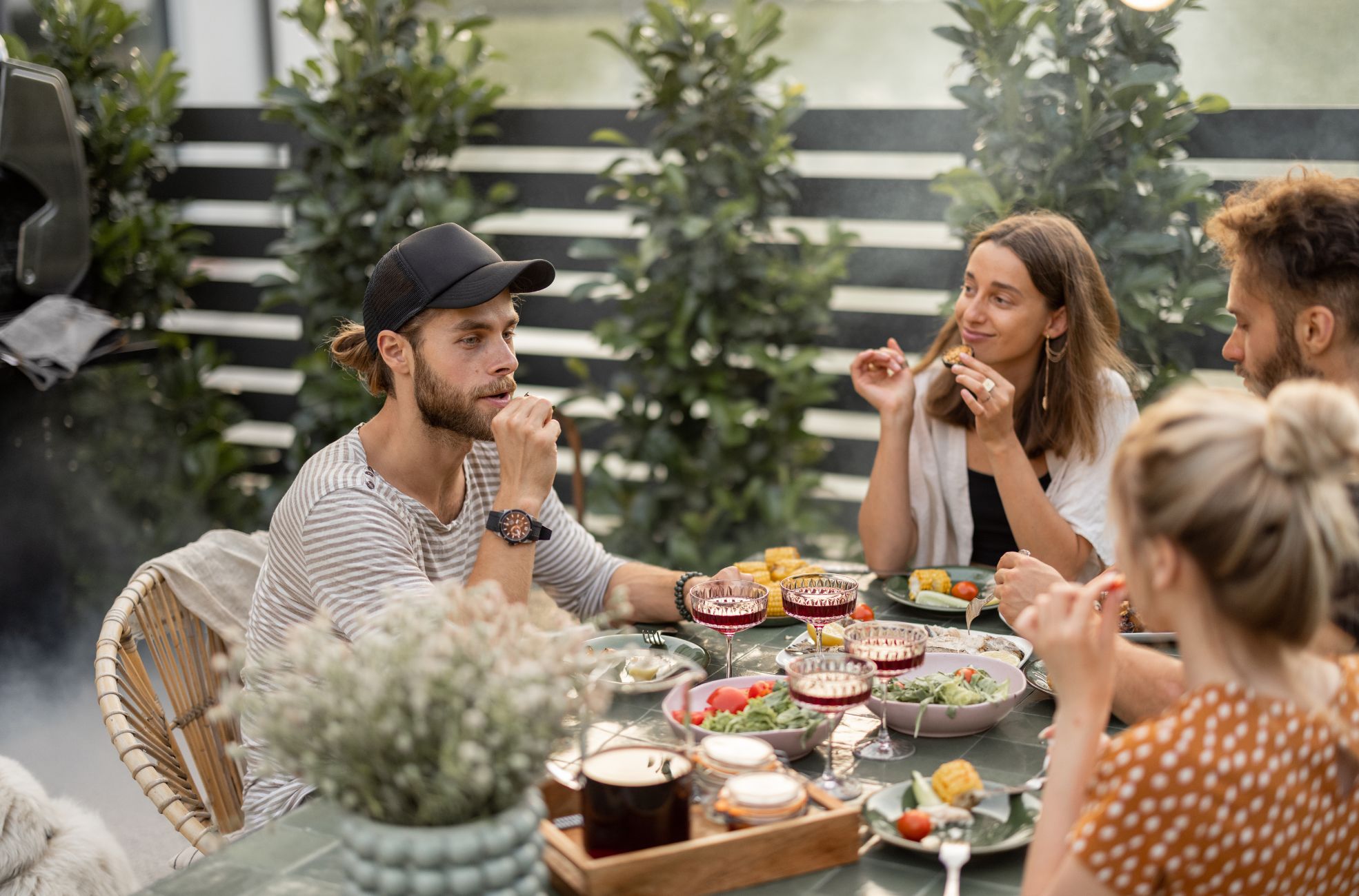 People Enjoying A Long Lunch