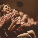 People In Moment Of Cheering